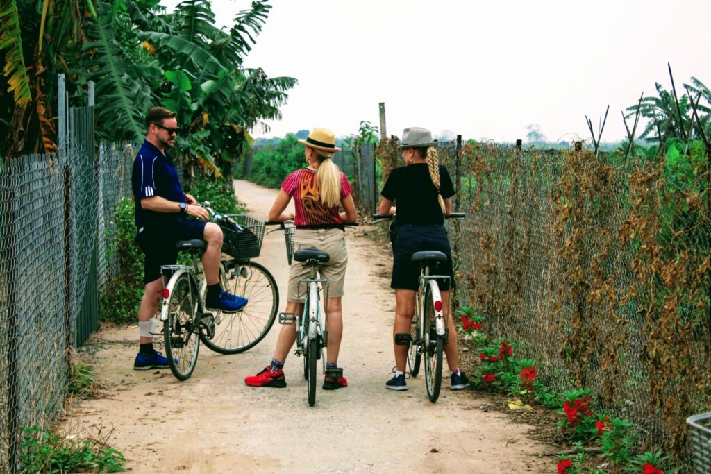 a man riding on the back of a bicycle