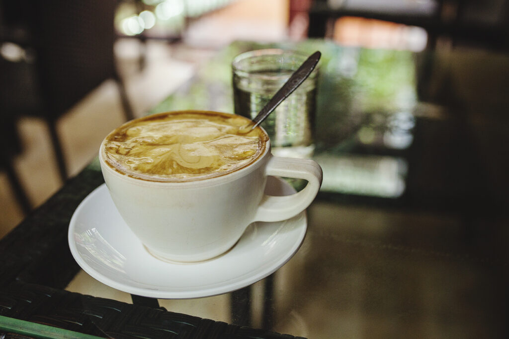 a cup of coffee on a table