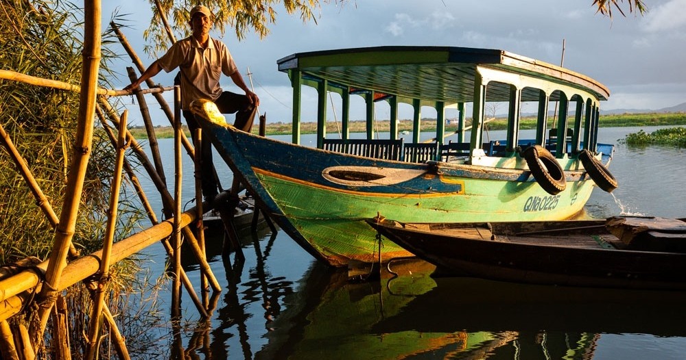a small boat in a body of water