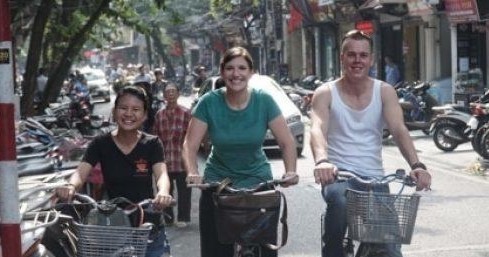 a person riding a motorcycle on a city street