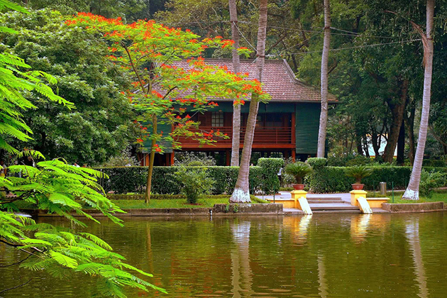 a body of water with trees in the background