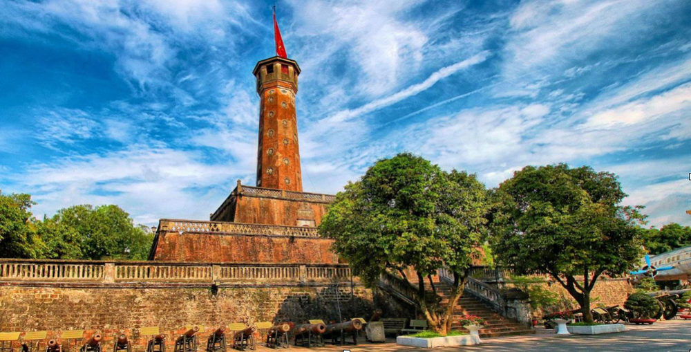 a large brick building with a clock tower