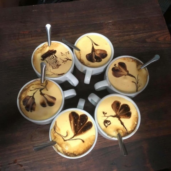 a bowl of food on a wooden table