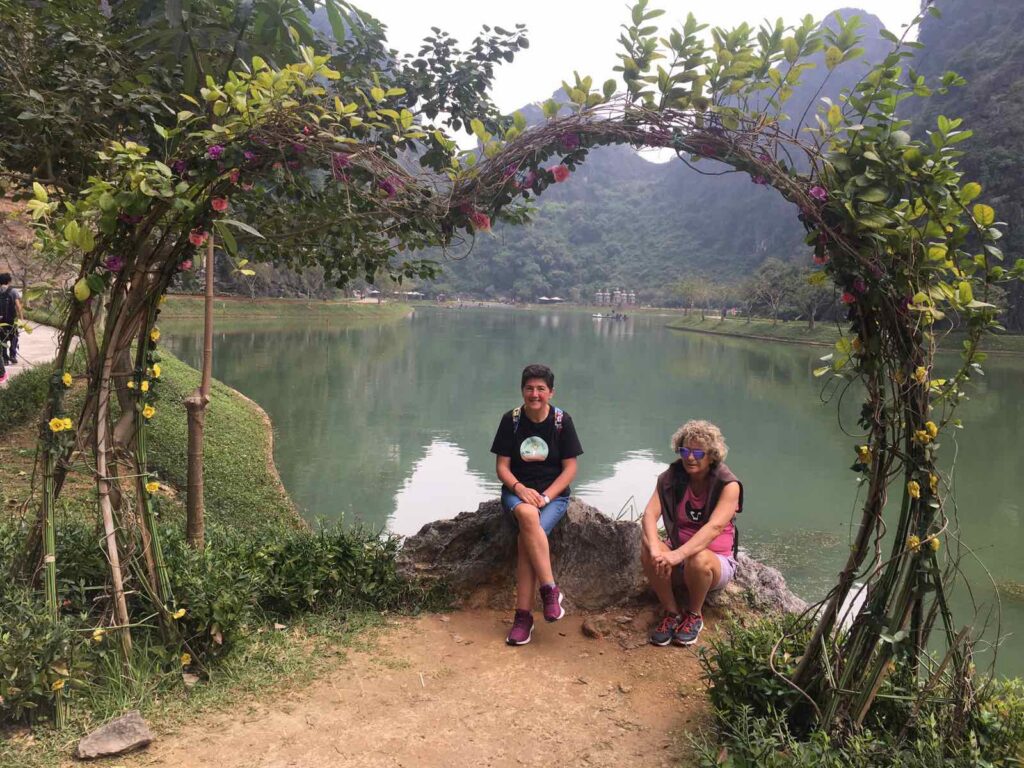 a person standing in front of a lake