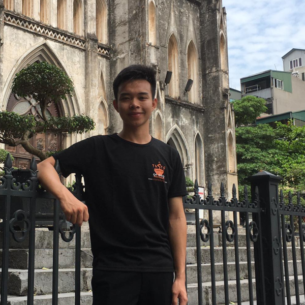 a man standing in front of a building