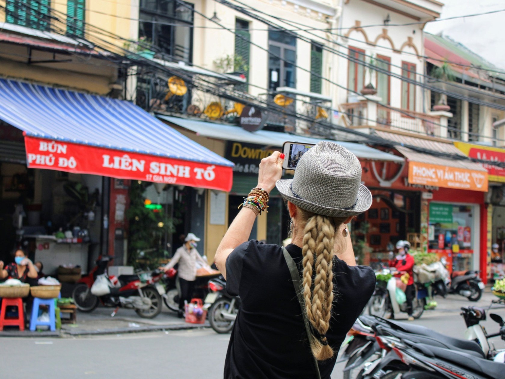 a person walking down a busy city street