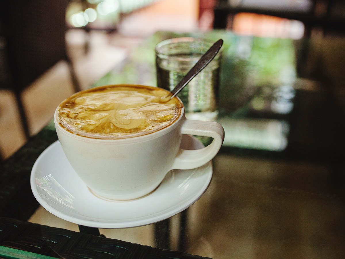 a cup of coffee on a table
