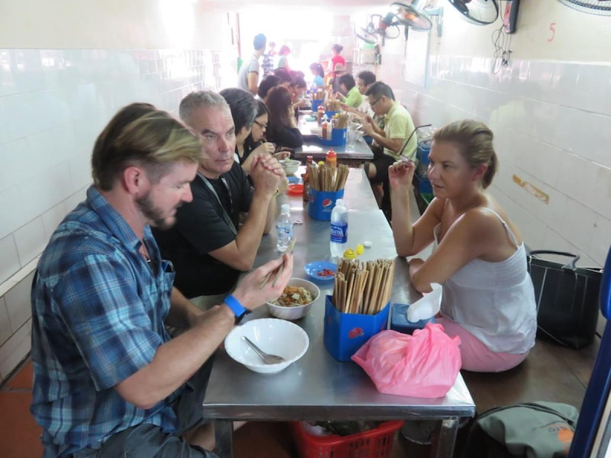 a group of people sitting at a table
