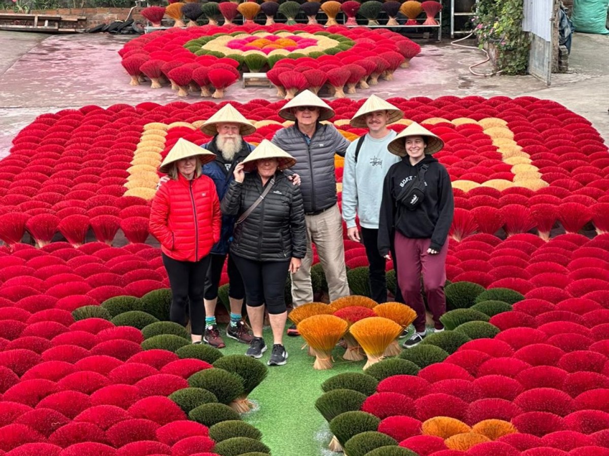 a group of people in a garden