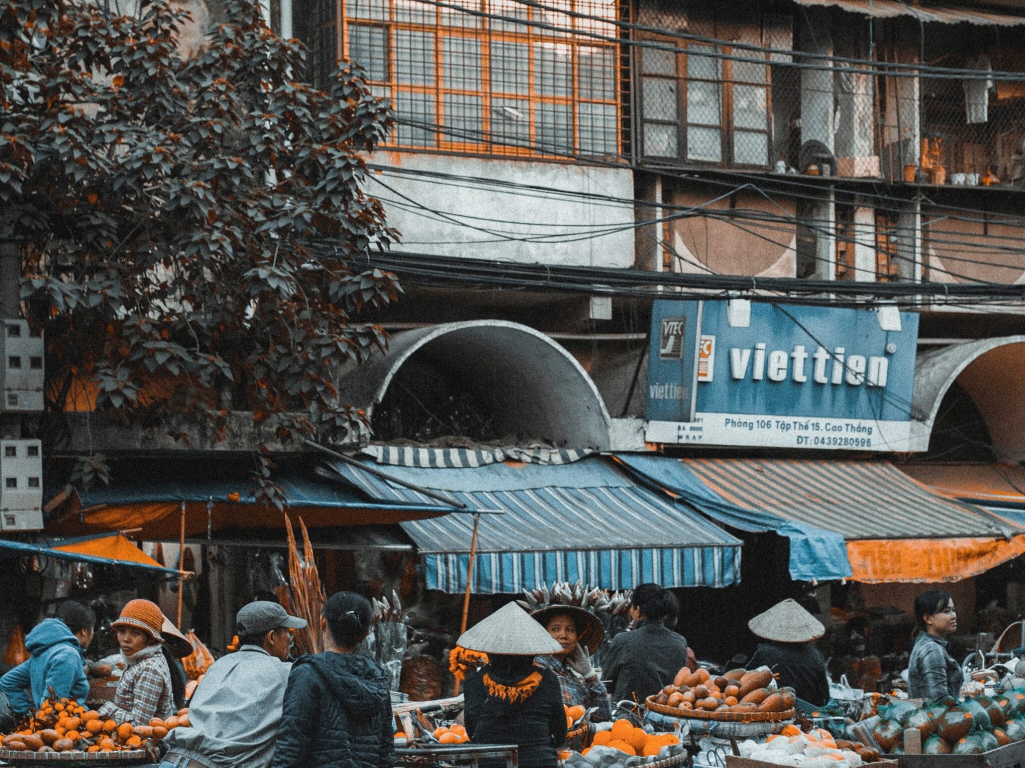 a group of people standing in front of a building
