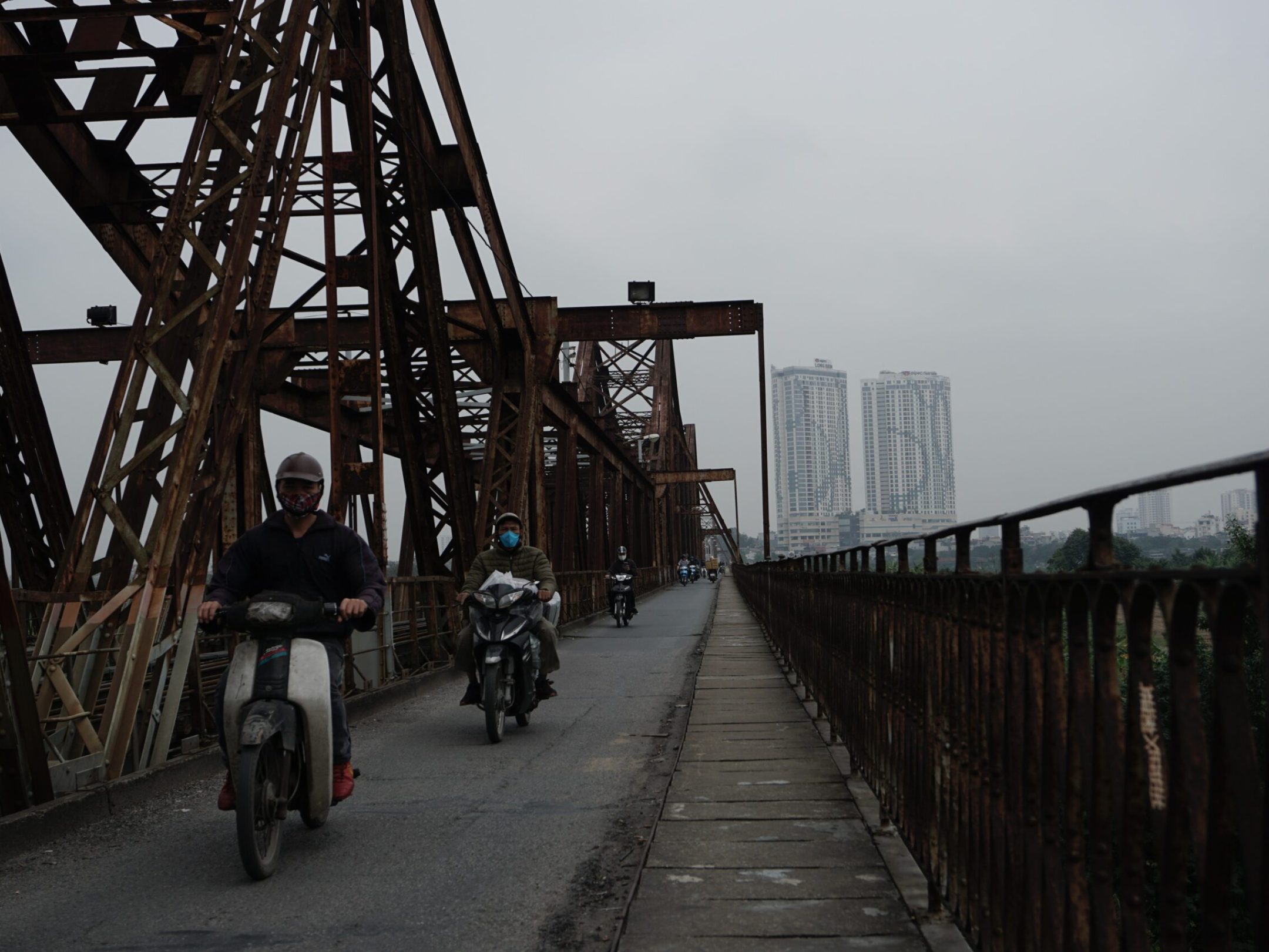 a person standing on a bridge