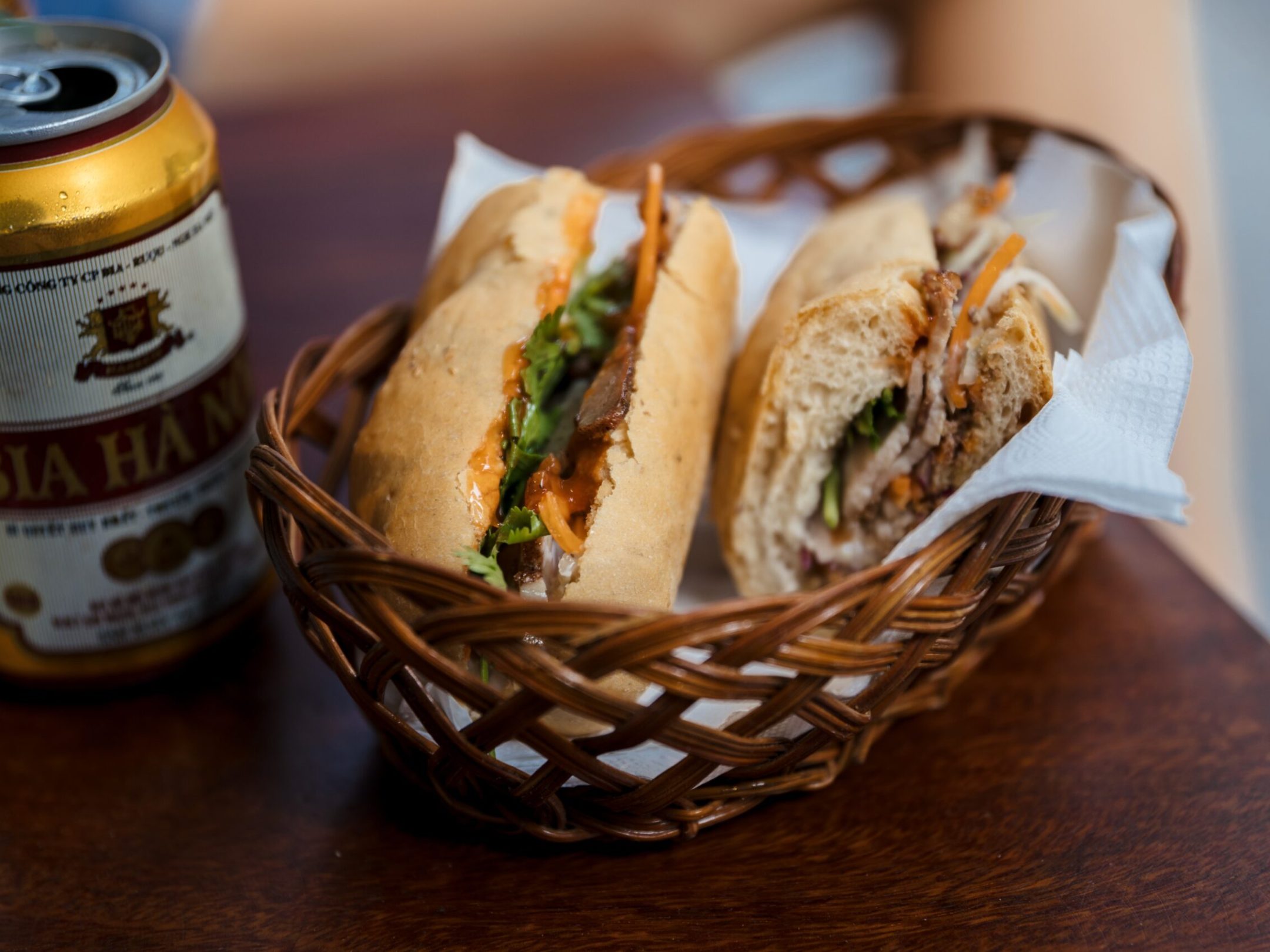 a sandwich sitting on top of a wooden table