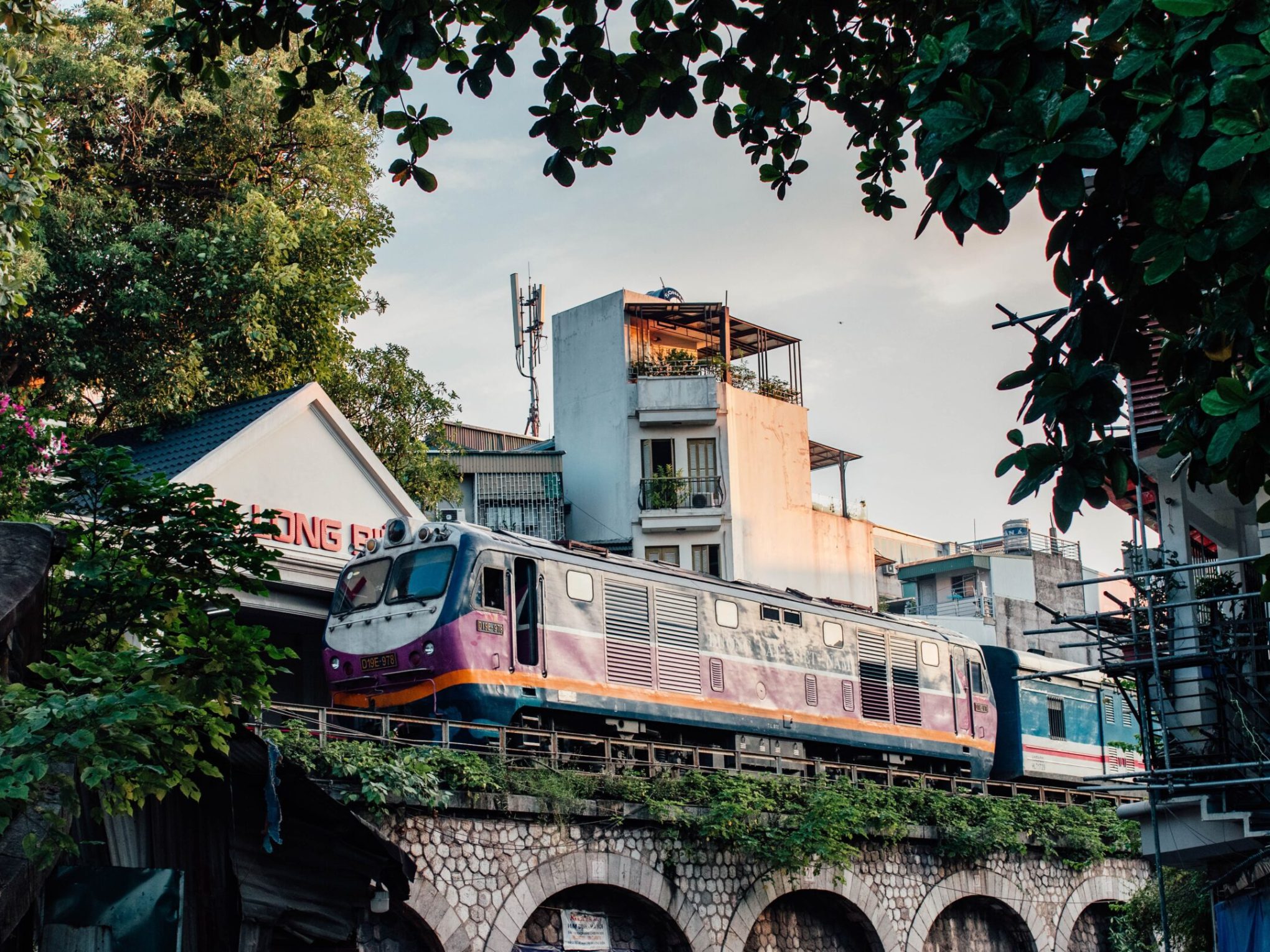 a building next to a tree