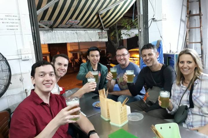 a group of people sitting at a table