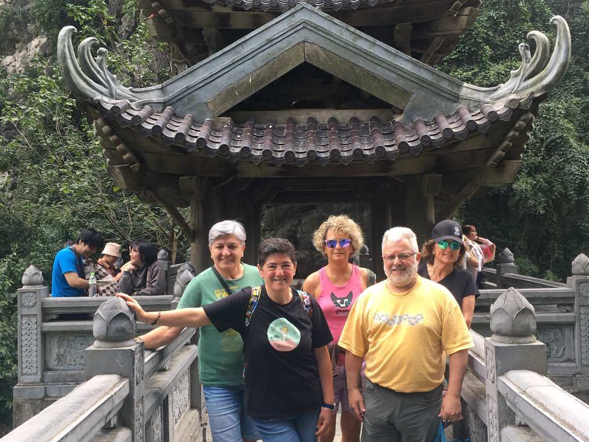 a group of people standing in front of a building