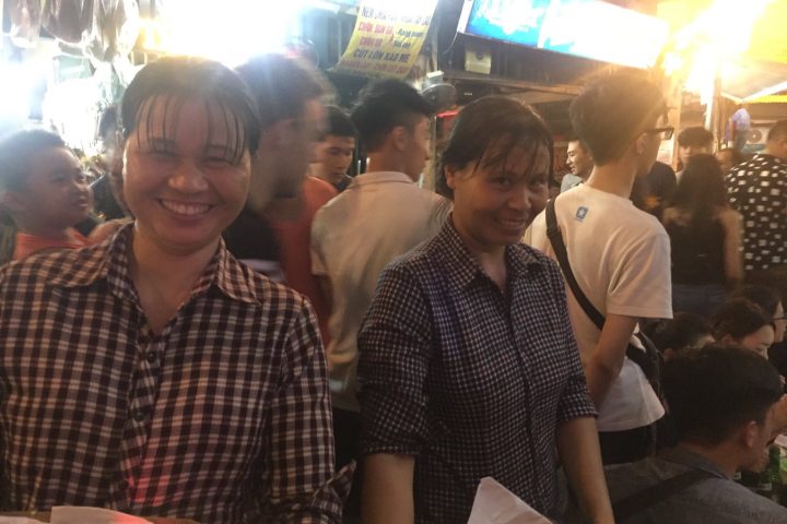 a group of people sitting at a table