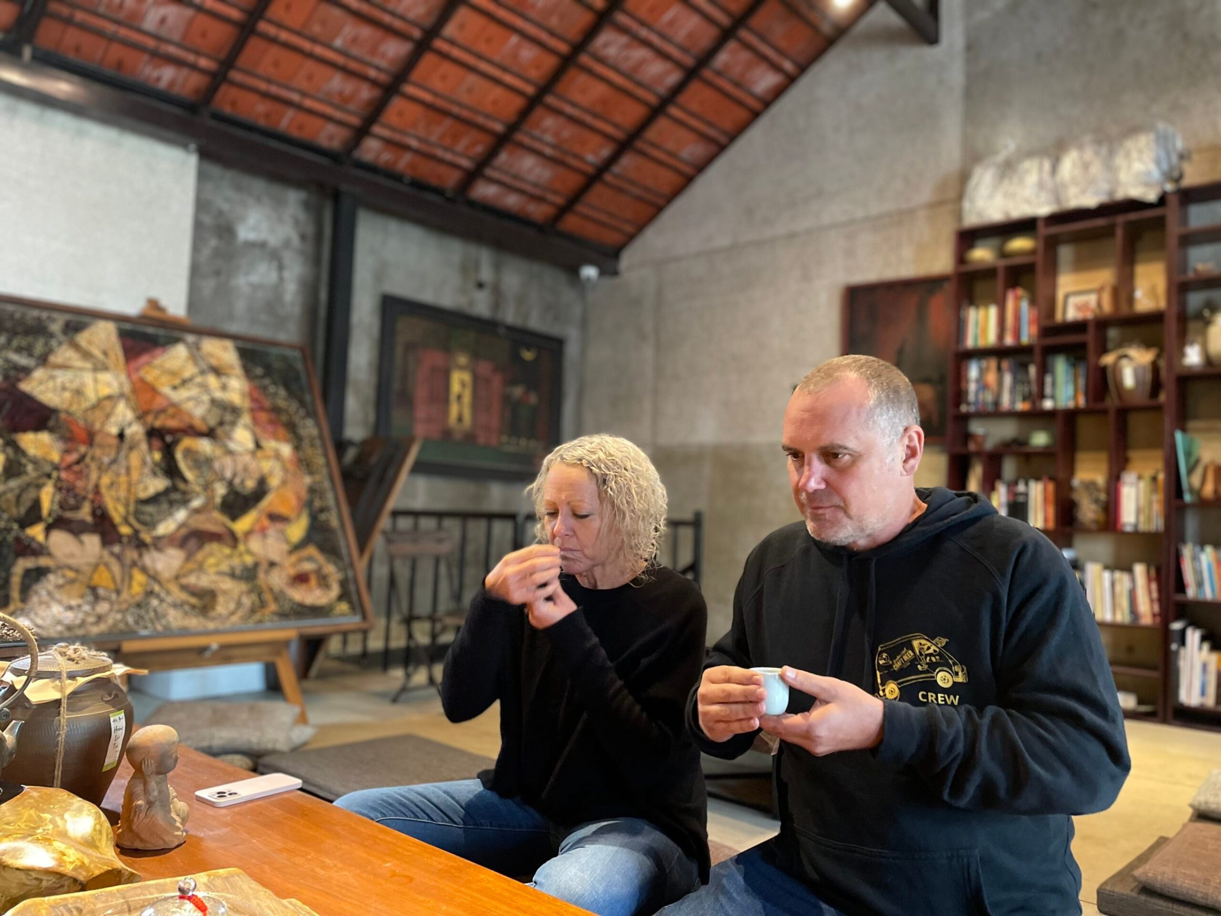 a person holding a wine glass