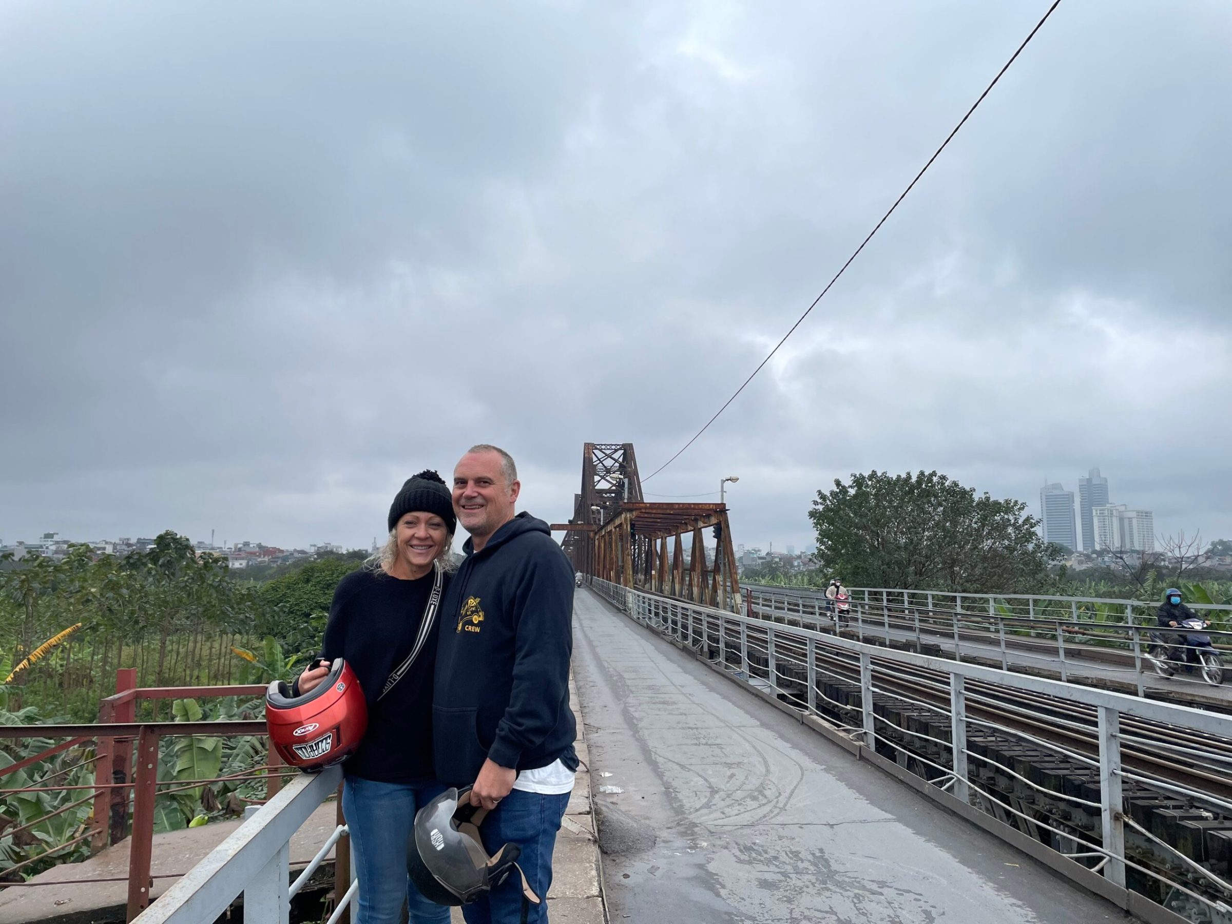 a man standing on a bridge