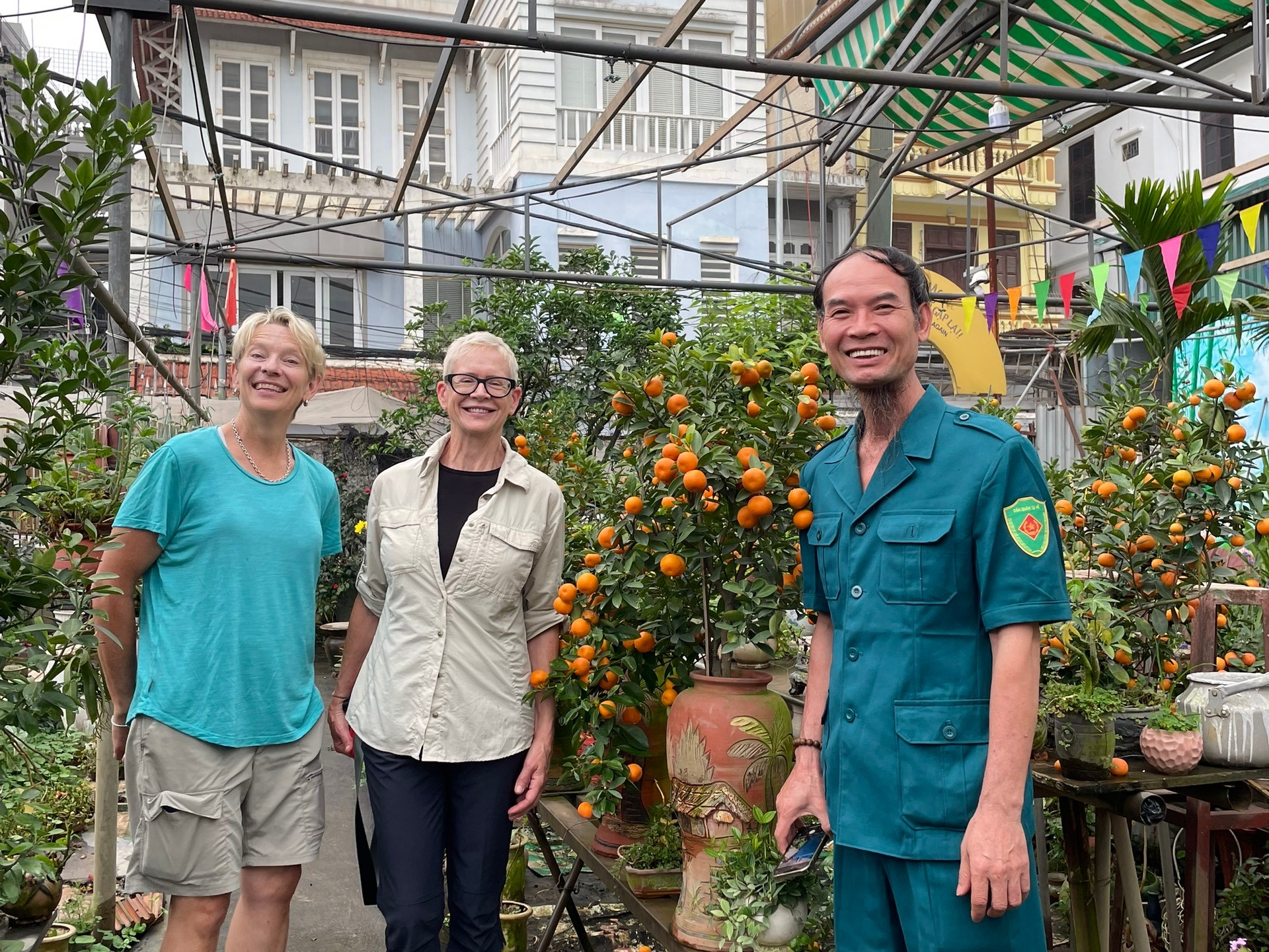 Thadeus Nguyễn Văn Lý et al. standing in front of a building