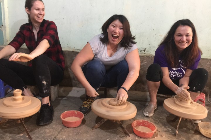 a group of people sitting at a table