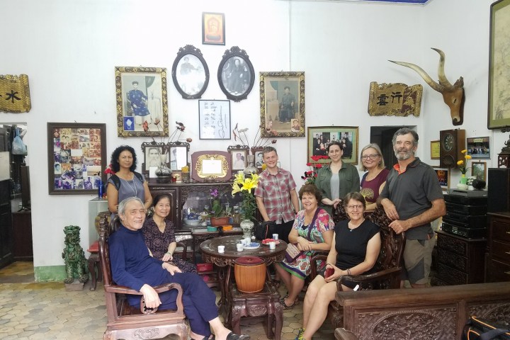 a group of people posing for the camera