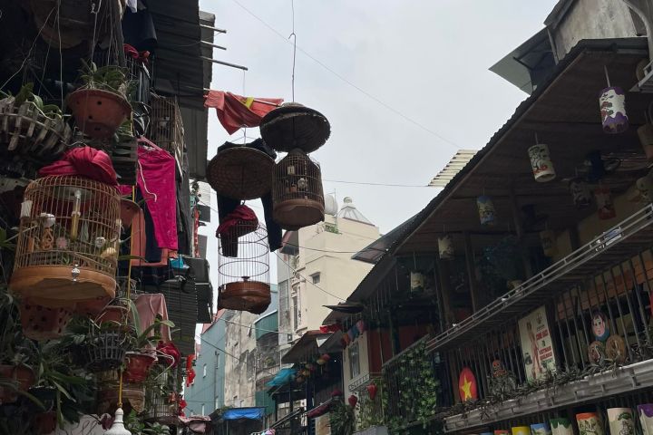 a group of people walking down a street