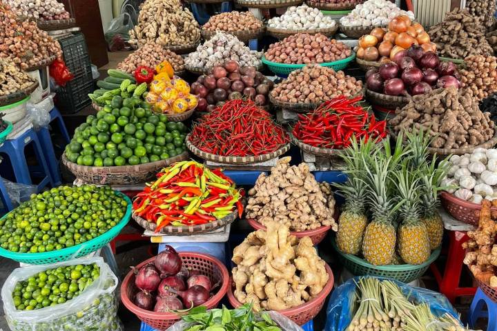 a close up of many different vegetables on display