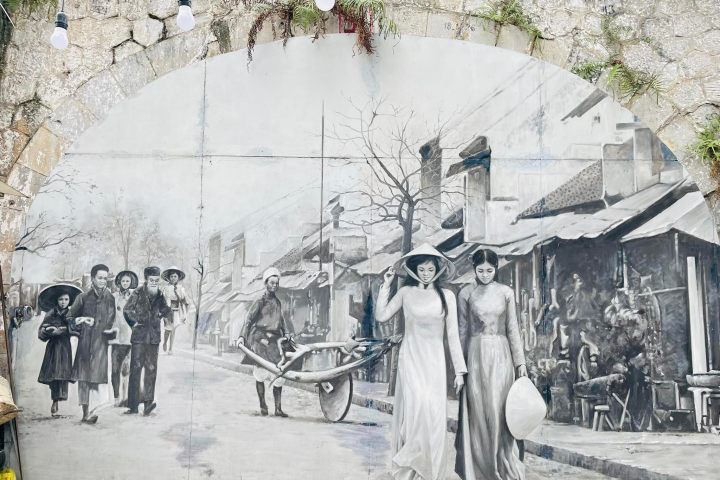 a group of people riding on the back of a horse drawn carriage