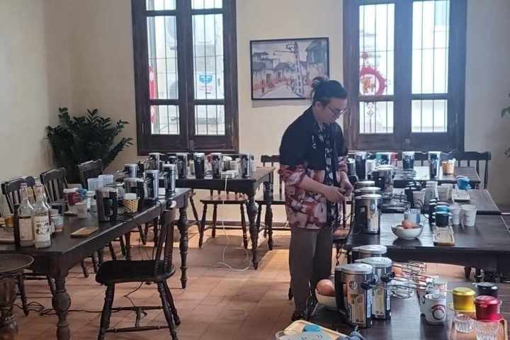 a dining room table in front of a window