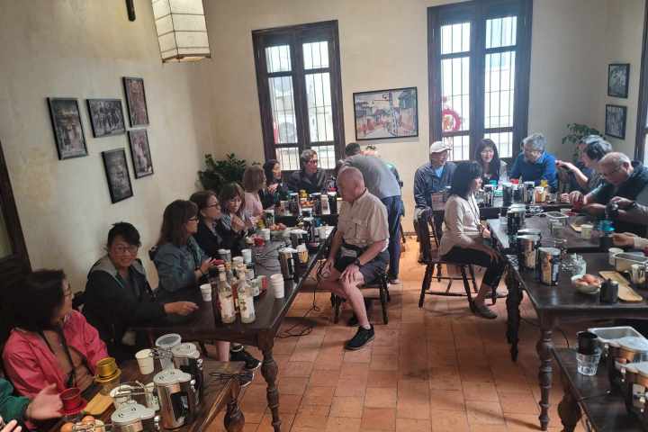 a group of people sitting at a table