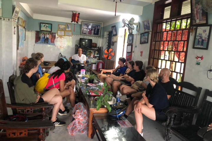 a group of people sitting at a table