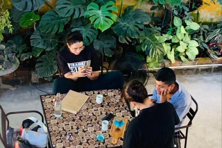 a group of people sitting at a table