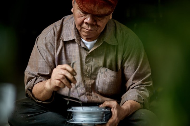 a man sitting on a table