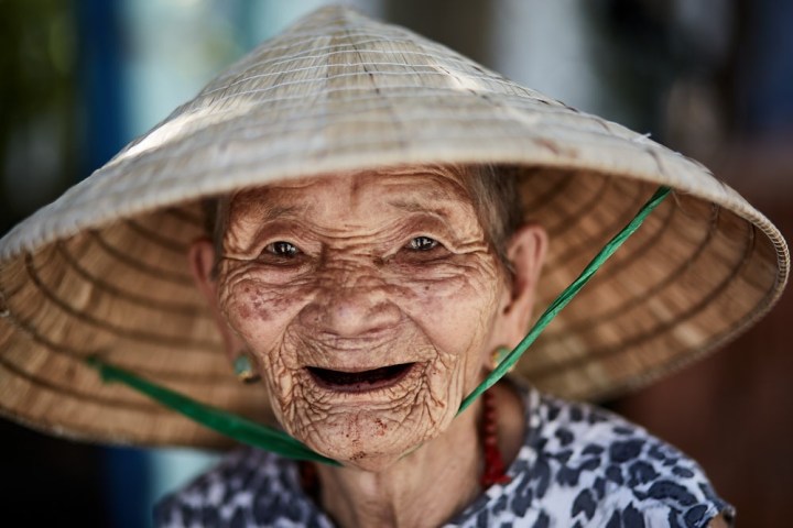 a close up of a person wearing a hat