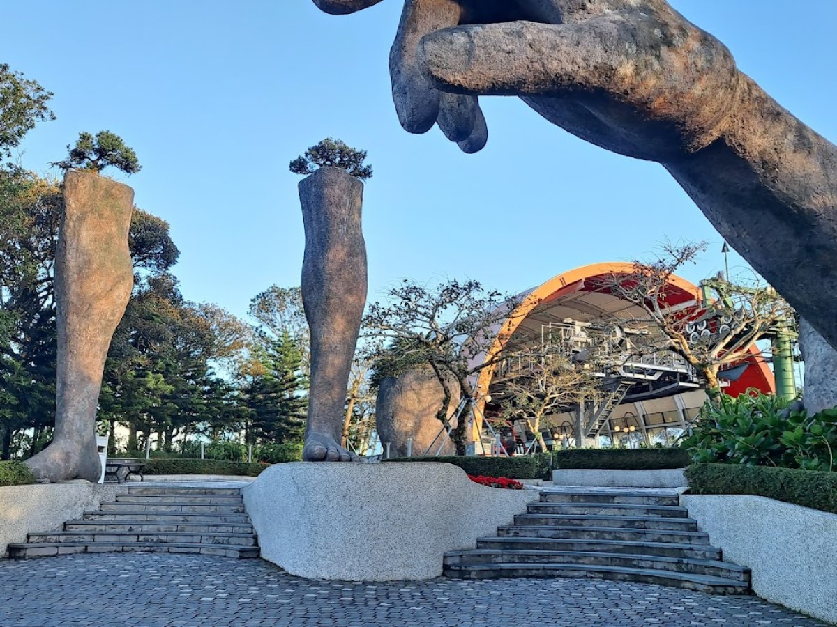 a man doing a trick on a rock