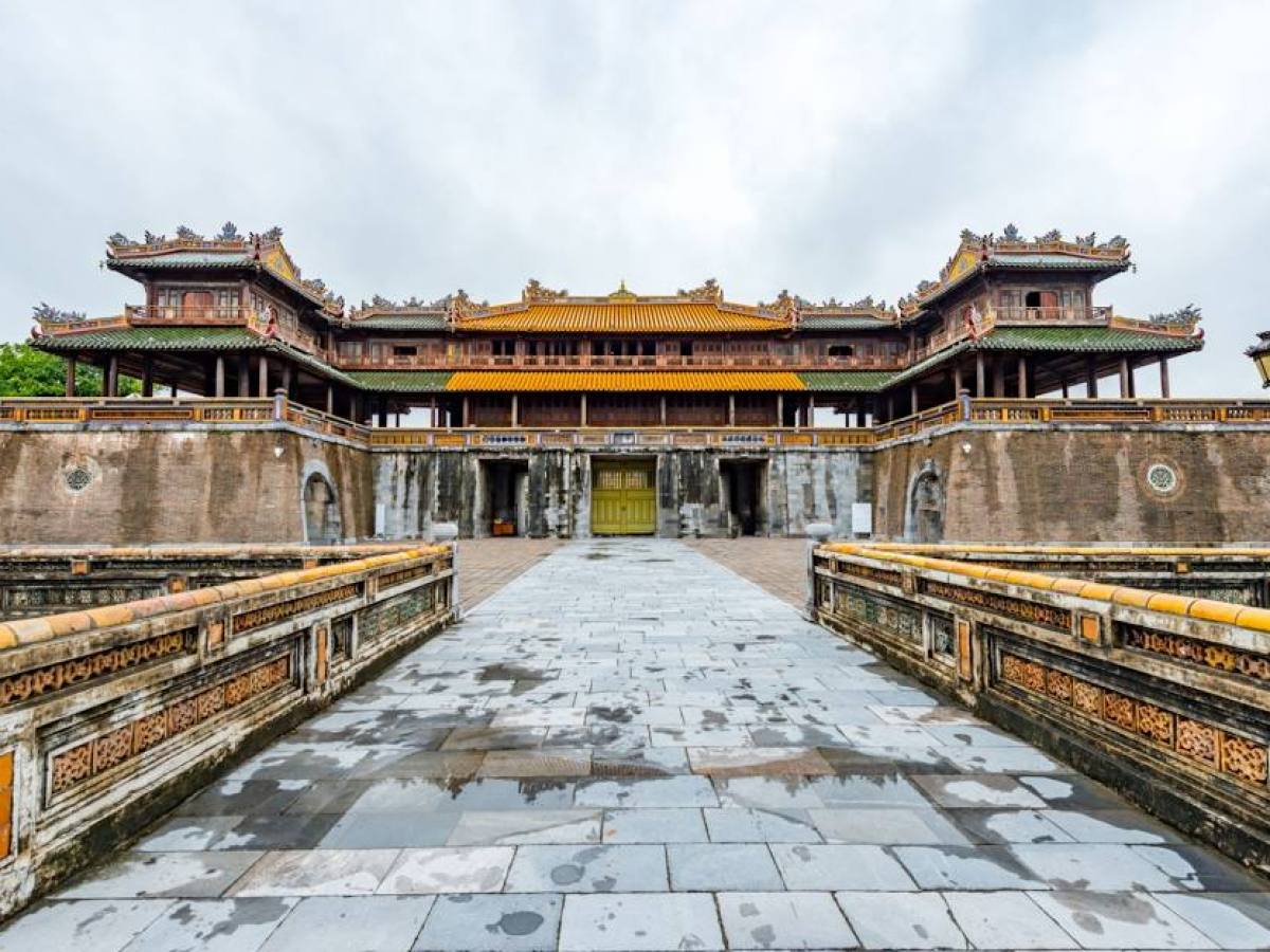 a train is parked on the side of Hue