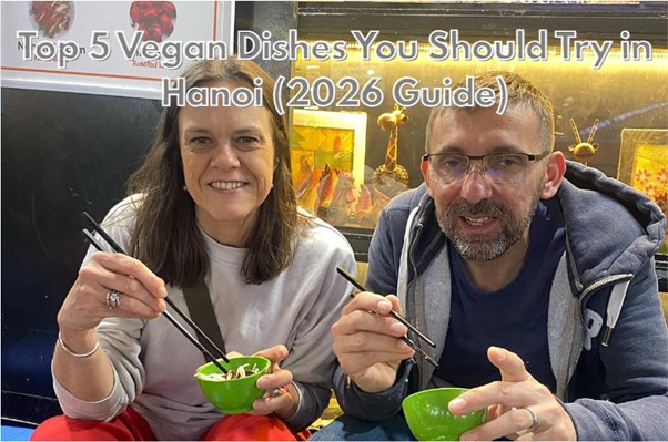 Two people eating, text: 'Top 5 Vegan Dishes You Should Try in Hanoi (2026 Guide)'.